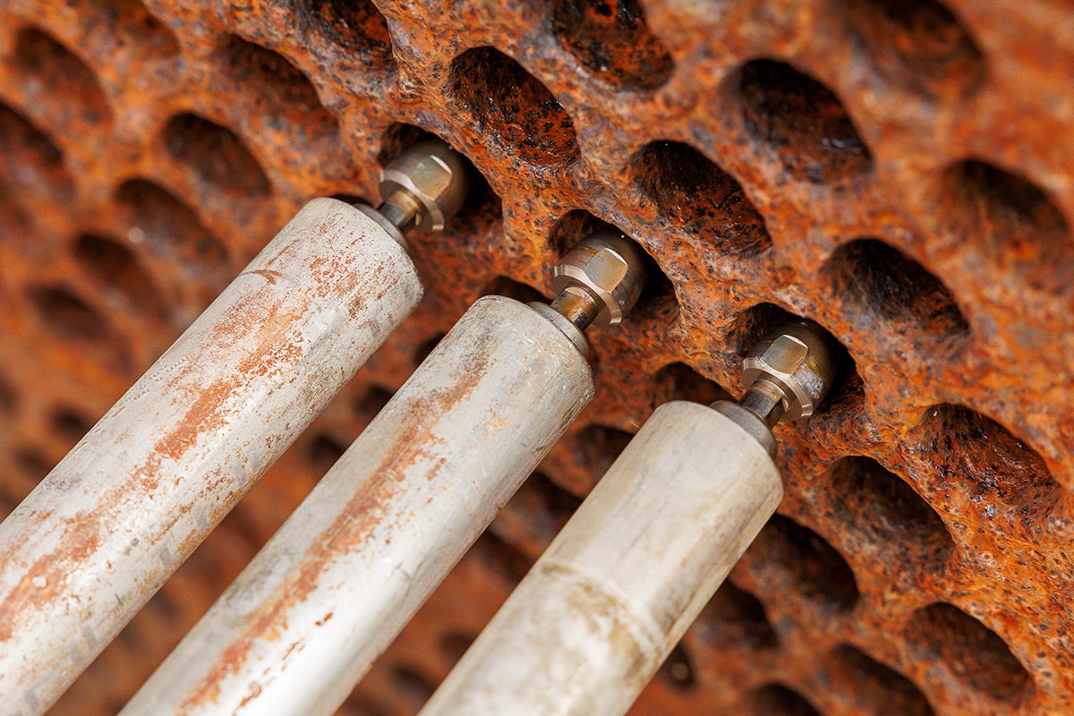 What tube cleaning methods work best for scale removal?